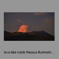 lava lake inside Masaya illuminating steam cloud